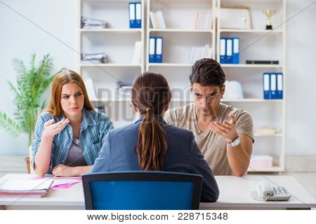 Young family dissappointed at high interest mortgage rate in bank