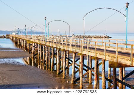 Low Tide At The Famous 1,500 Ft. Long Wooden Pier In White Rock, Bc, Surrounding Semiahmoo Bay Near 