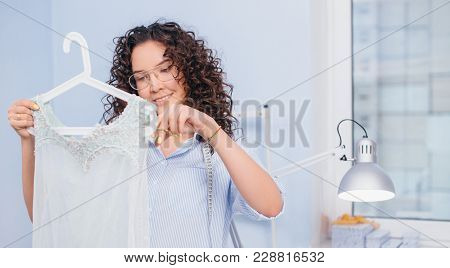 Tailor Cutting Old Nightgown To Make New One. Remodeling Clothers. Remaking Outfit.