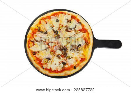 Pizza Whole Round On A Black Tray, Blackboard, Cut Into Pieces, On A White Isolated Background. Fast