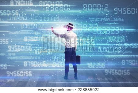 Businessman in vr glasses with variable fast changing numbers around