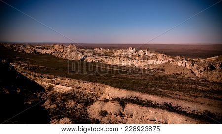 Panorama View To Aral Sea From The Rim Of Plateau Ustyurt At Sunset In Karakalpakstan, Uzbekistan