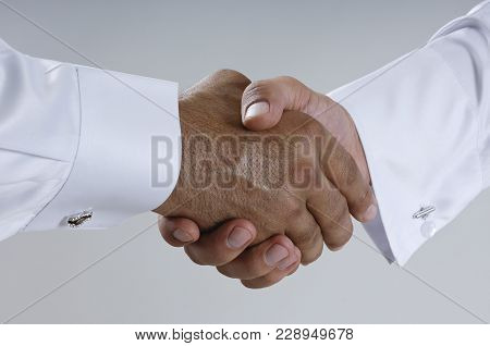 Saudi Arab Businessmen Hands Shaking, Making Agreement And Welcoming Closeup