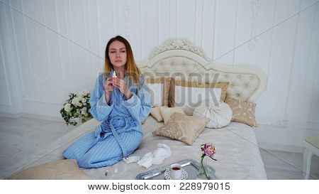 Cute Female Taking Cold Pill In Hand And Puts Aside And Showing Gesture Refuses Pharmaceuticals. You