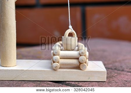 Rustic Egological Toy Well For Children. Retro Object