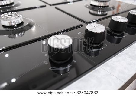 Fragment Of A Gas Kitchen Stove. Fragment Of A Gas Kitchen Stove. Clean Gas Stove Closeup