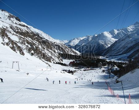 Azau Valley, Mount Elbrus, Russian Federation - Feb, 2010: People Are Skating Skiing On The Slope In