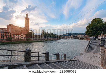 Panoramic View On The Dige River In The Evening In Verona. Italy