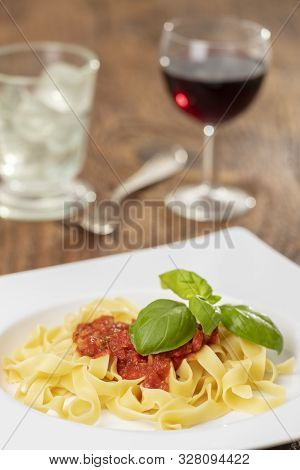 Italian Tagliatella Pasta With Tomato Sauce And Wine