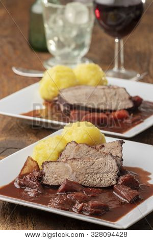 Bavarian Roasted Beef With Dumplings On Wood