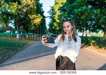 Teenage Girl Schoolgirl, Teenager Headphones Taking Pictures Themselves Phone, Happy Smiling Having 
