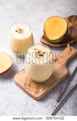 Mango Lassi Or Lassie , Yogurt Or Smoothie. Healthy Probiotic  Cold Summer Drink, Mango Beverage