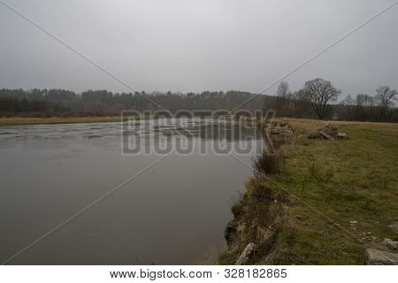 Beautiful Polish Autumn Cold Gray Cloudy November Landscape Of Podlasie With The River Bug