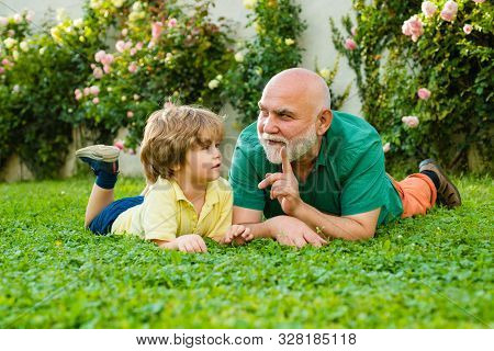 Two Different Generations Ages: Grandfather And Grandson Together. Two Generation - Weekend Together