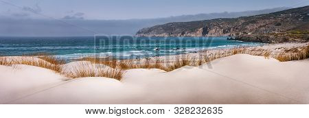 Panoramic Costal View Of Praia Do Guincho Beach With Cresmina Dunes In Foreground. Cascais, Portugal