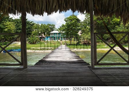 View To The Green Lake Side From The Dock At Lake Itza, El Remate, Guatemala