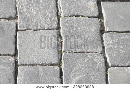 Detail Of Gray Tiles Called In Italian Sampietrini Or Pave In Francey