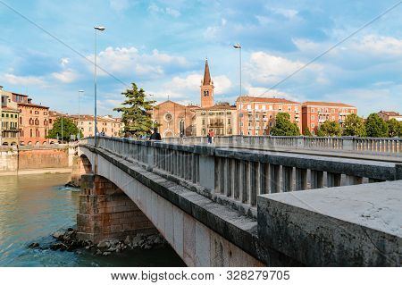 Panoramic View On The Dige River In The Evening In Verona. Italy