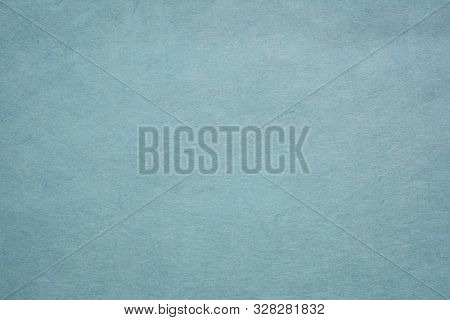 background and texture of slate blue Korean hanji paper handmade from inner bark of the mulberry tree