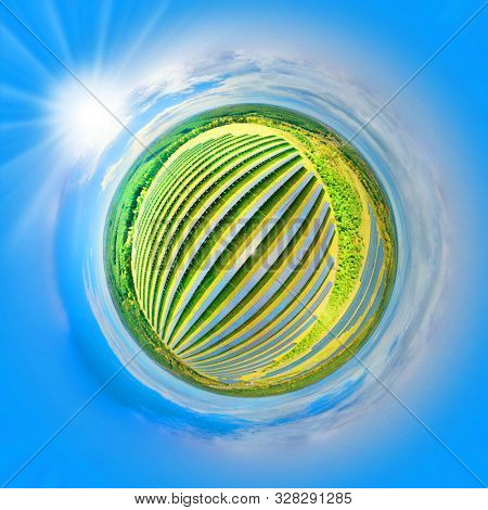 360 degrees aerial panorama to solar power plant. Tiny planet with environmentally friendly electricity. Industry and renewable resources theme.
