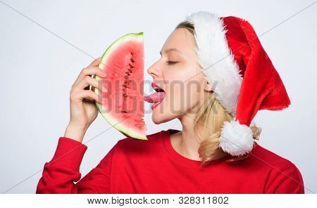 Christmas Girl Eat Watermelon. Prolong Summer. Travel Christmas Vacation And Holidays Resort. Delici