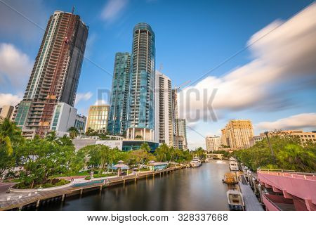 Fort Lauderdale, Florida, USA cityscape and riverwalk on the New River.