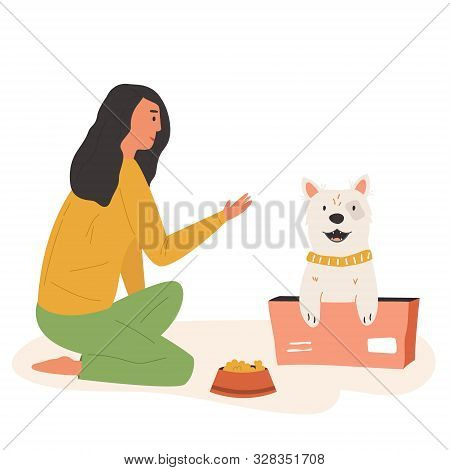 Young Cute Volunteer Girl Feeding Street Dog