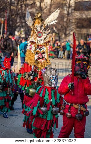 Mummers Perform Rituals To Scare Evil Spirits At Surva Festival At Pernik In Bulgaria. The People Wi