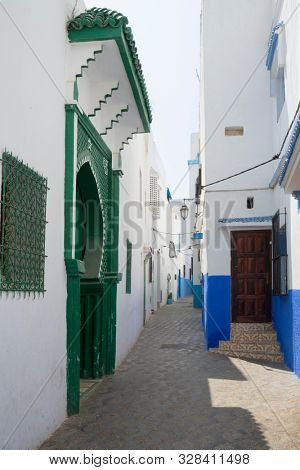 Narrow old street  in the medina of Asilah, Morocco