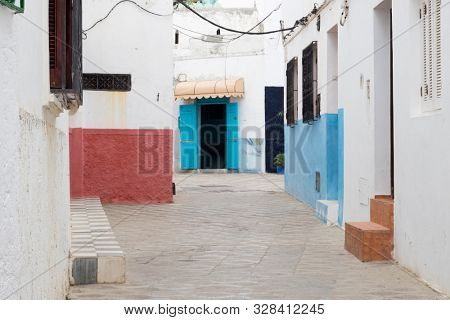 Narrow old street  in the medina of Asilah, Morocco