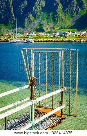 Fishing Port Old Pier And Gate With Bleik Village Houses In The Background. Andoya Island, Vesterale