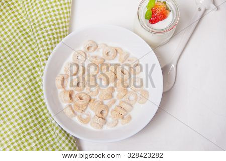 Delicious And Nutritious Cereal Loops In A Bowl With Milk For Healthy Breakfast For Kids