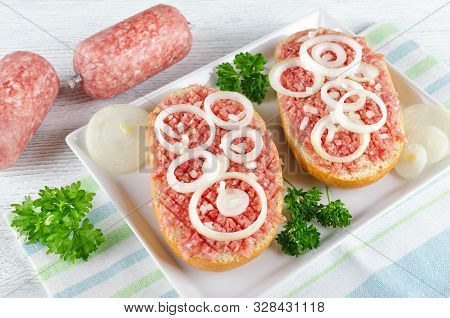 German Food Mett Ground Pork, Bun And Raw Meat With Onion And Parsley