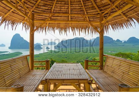 Wooden Table And Chairs In Thai Pavilion At Samet Nangshe Viewpoint With Sea In Phang Nga Bay, Touri