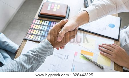 Handshake Of Two Business People Meeting Collaboration After Contract Agreement To Become A Partner.