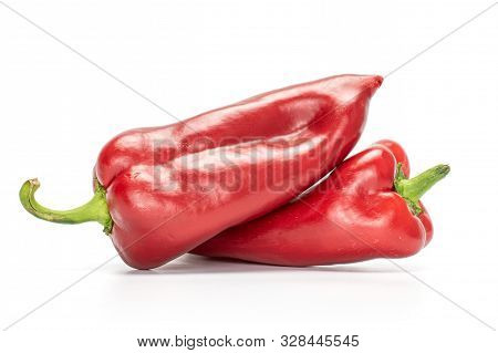 Group Of Two Whole Sweet Red Bell Pepper Isolated On White Background