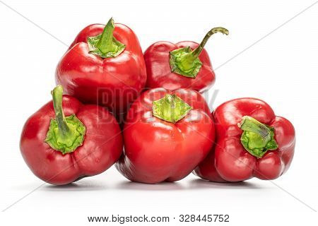 Group Of Five Whole Sweet Red Bell Pepper Isolated On White Background