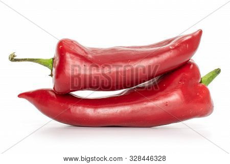 Group Of Two Whole Ripe Sweet Red Bell Pepper Isolated On White Background