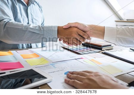 Finishing Up A Meeting Collaboration, Handshake Of Two Business People After Contract Agreement To B