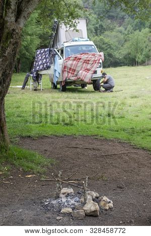 Encuentro Park, Chiapas, Mexico - May14th , 2018: Fire Pit With Camper Van At The Background