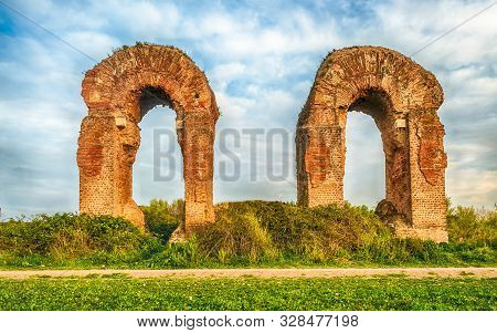 Ruins Of The Iconic Parco Degli Acquedotti, Rome, Italy. The Public Park Is Named After The 7 Ancien