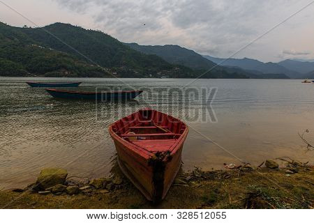 Colorful Boats In Fewa Lake After The Storm In Pokhara, Nepal