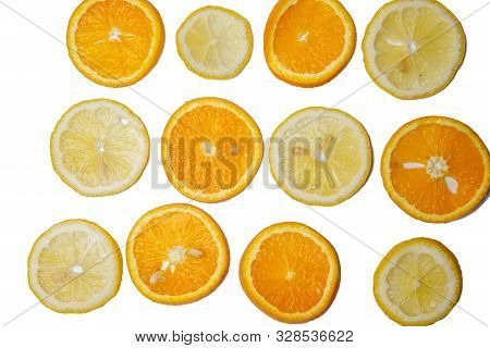 Slices Of Lemons And Oranges Are Isolated