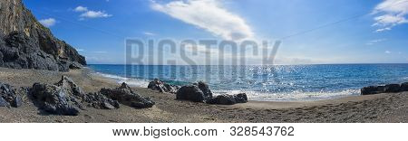 Panoramic View Of A Beach Of Marina Di Camerota (salerno, Italy) In A Sunny Day At The Sunset