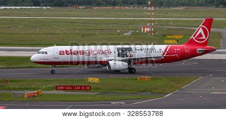 Airplane Taxi In Dusseldorf Airport