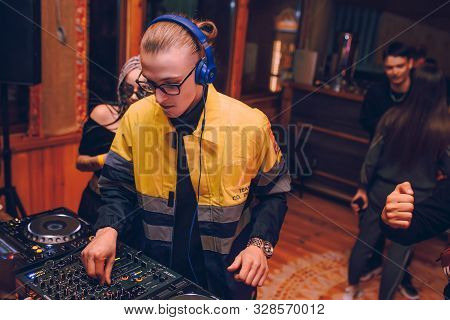 Chisinau, Moldova 11.10.2019. Rave Techno Dj Plays Concert Set With Cd Player Turn Table & Pioneer S