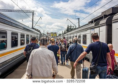Kaluga, Russia - August 2017: Railway Station In The City Of Kaluga. Passengers Leave The Train