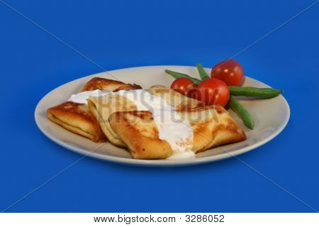 Pfannkuchen mit saure Sahne