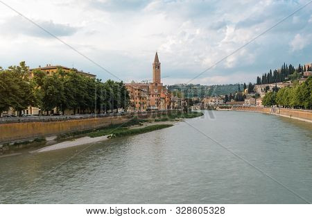 Panoramic View On The Dige River In The Evening In Verona. Italy