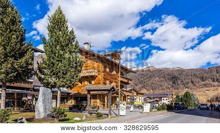 Livigno, Italy, April 2016 Traditional Alpine Wooden Architecture In The Village, Livigno Is A Ski C